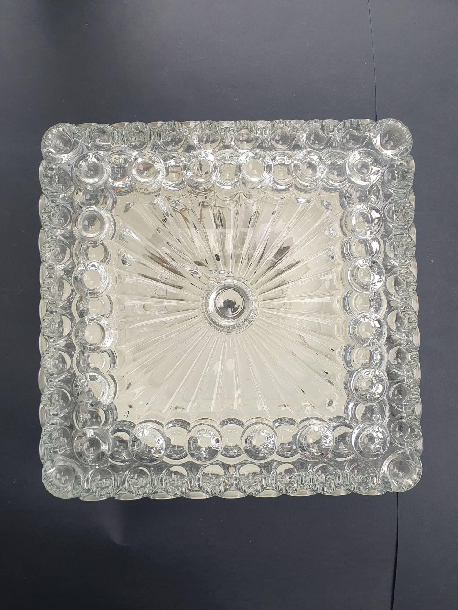 Large ceiling light or vintage wall sconce from the 1970s.