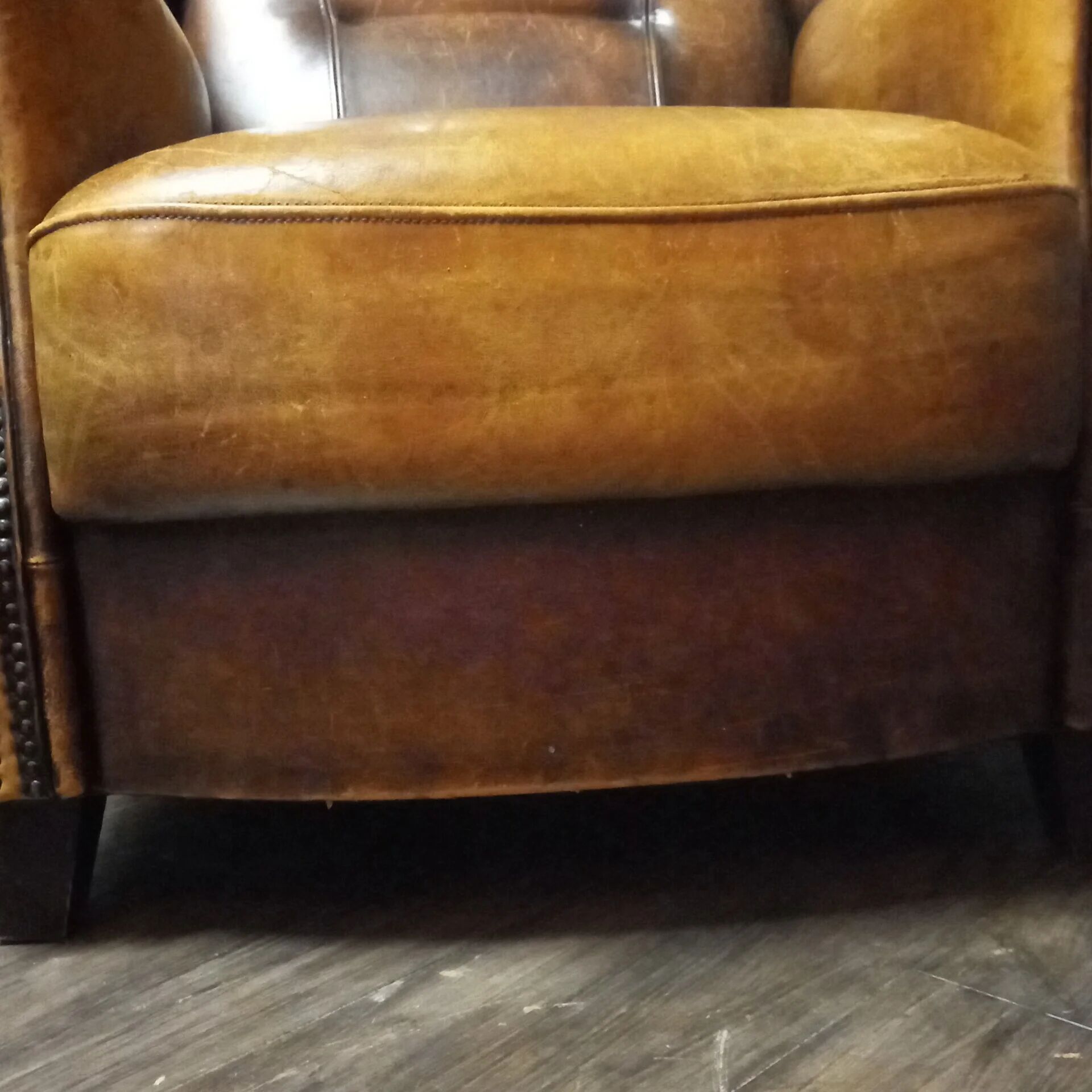 Robust vintage sheepskin armchair