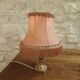 Vintage lamp, pink fringed pagoda shade and brass base.