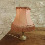 Vintage lamp, pink fringed pagoda shade and brass base.
