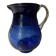 Vintage cobalt blue blown glass jug with a transparent handle.