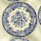 Set of 8 blue earthenware dinner plates with floral and bird decoration, 20th century