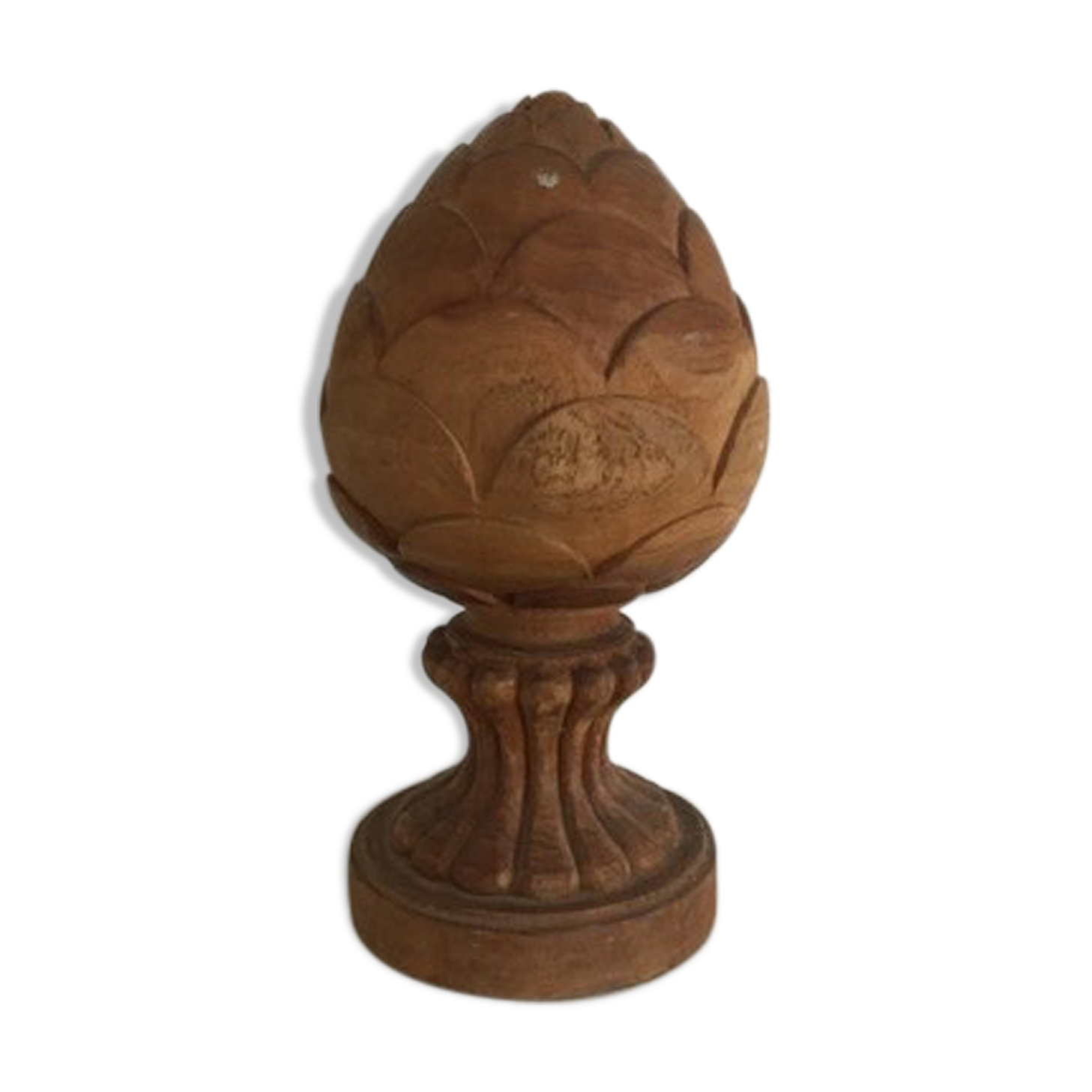 Carved wooden pine cone