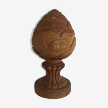 Carved wooden pine cone