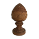 Carved wooden pine cone