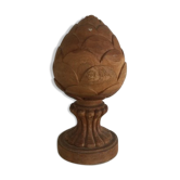 Carved wooden pine cone
