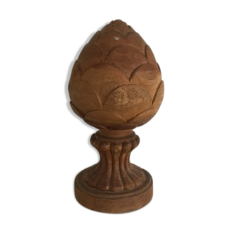 Carved wooden pine cone