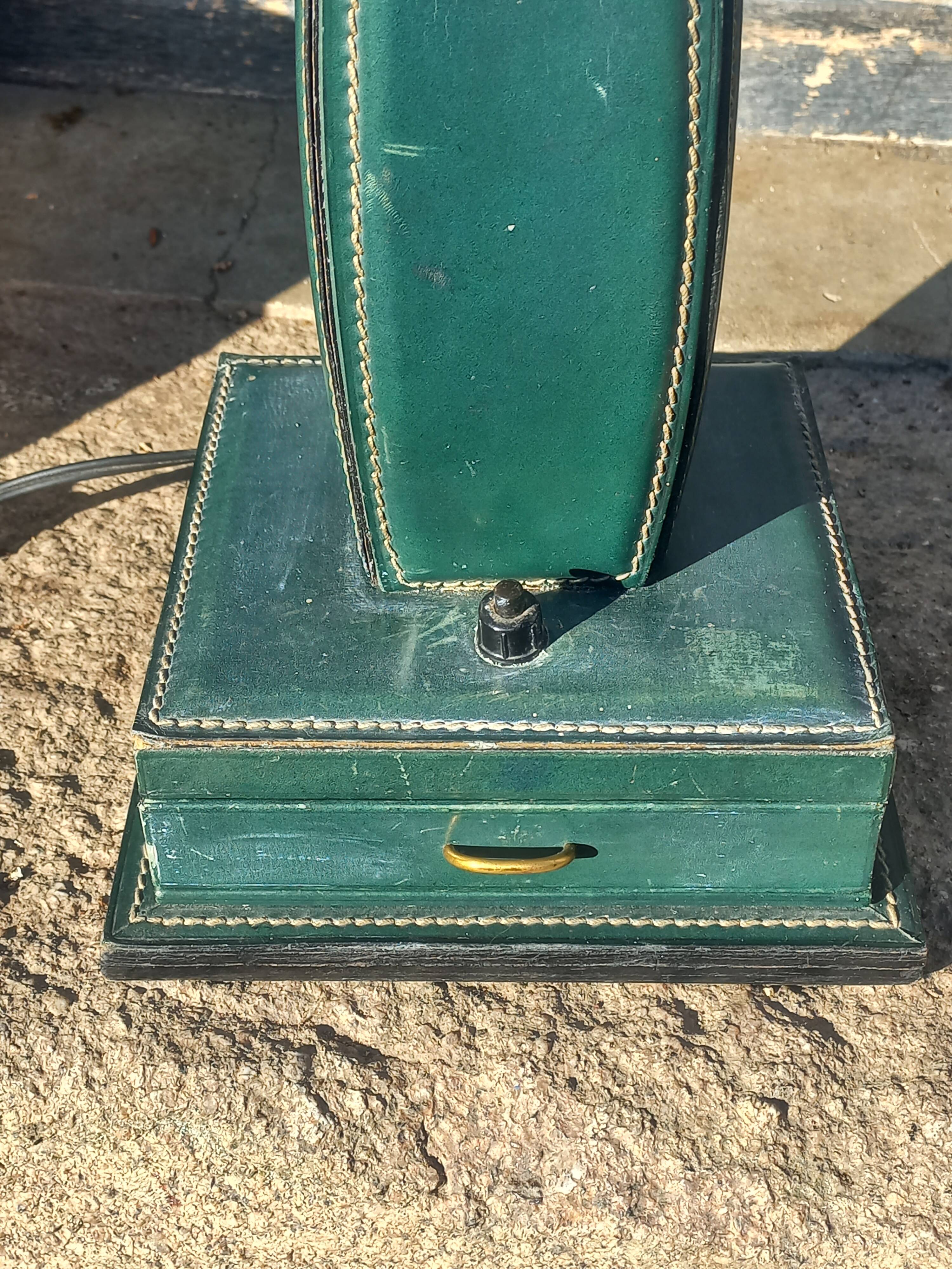 Vintage leather desk lamp with saddle stitching from the 1960s.