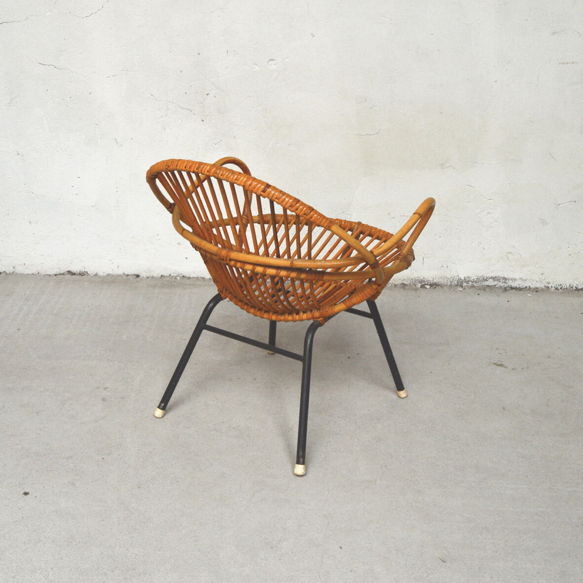 Round bamboo and rattan armchair