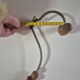 Vintage 1960s wall coat rack in wood and metal.