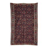 Tapis iranien à motifs floraux stylisés roses et bleus 155x105