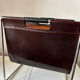 Leather and chrome magazine rack Brabantia