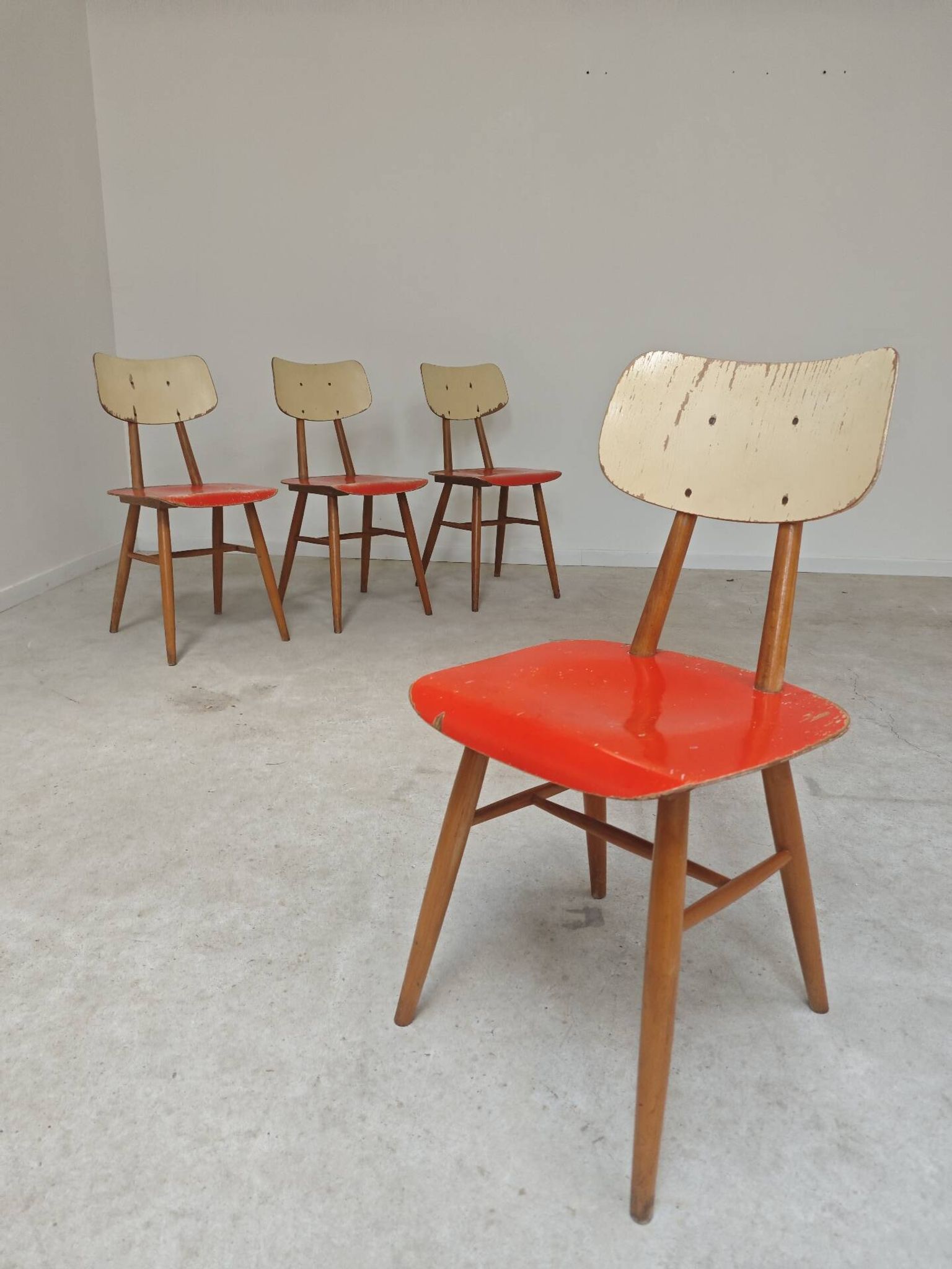 Set of 4 Ton (Thonet) red wooden chairs from the 1960s.