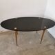 Oval coffee table in black opaline