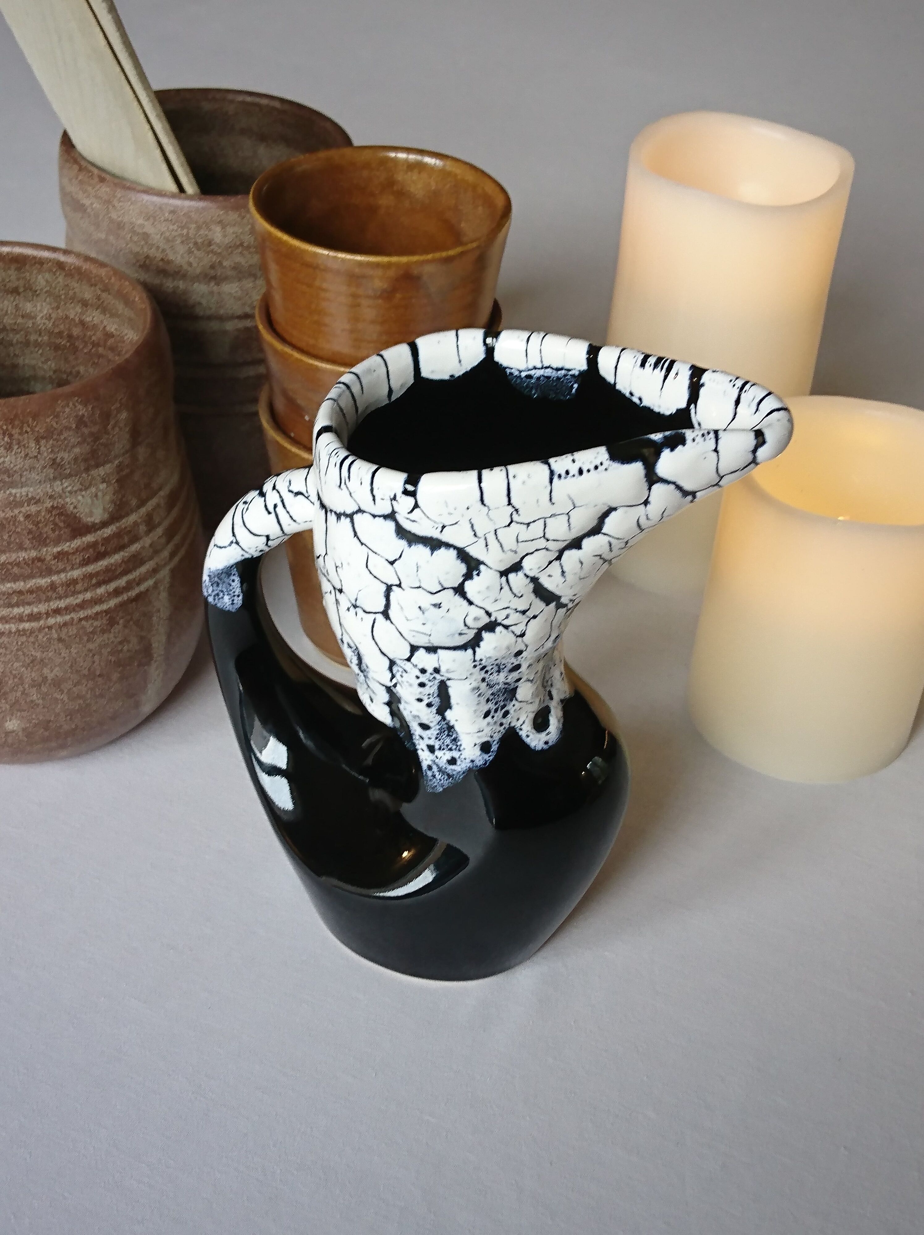Ceramic pitcher fat lava midnight blue and white signed