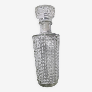 Old relief glass carafe with stopper