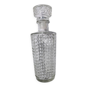 Old relief glass carafe with stopper