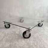 Beautiful designer glass coffee table on wheels