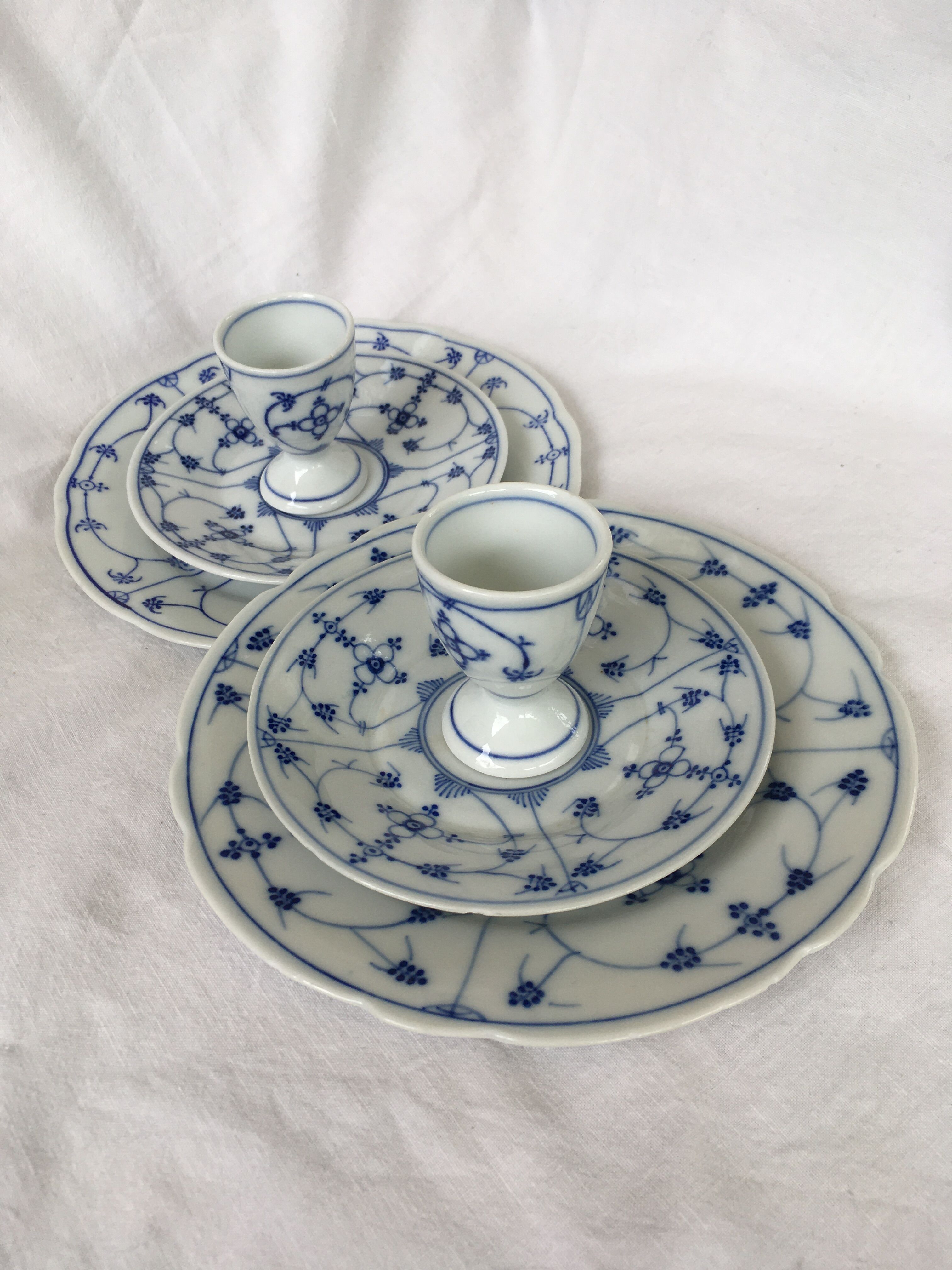 Breakfast coquetiers and porcelain plates