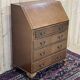 1950s English mahogany secretary.