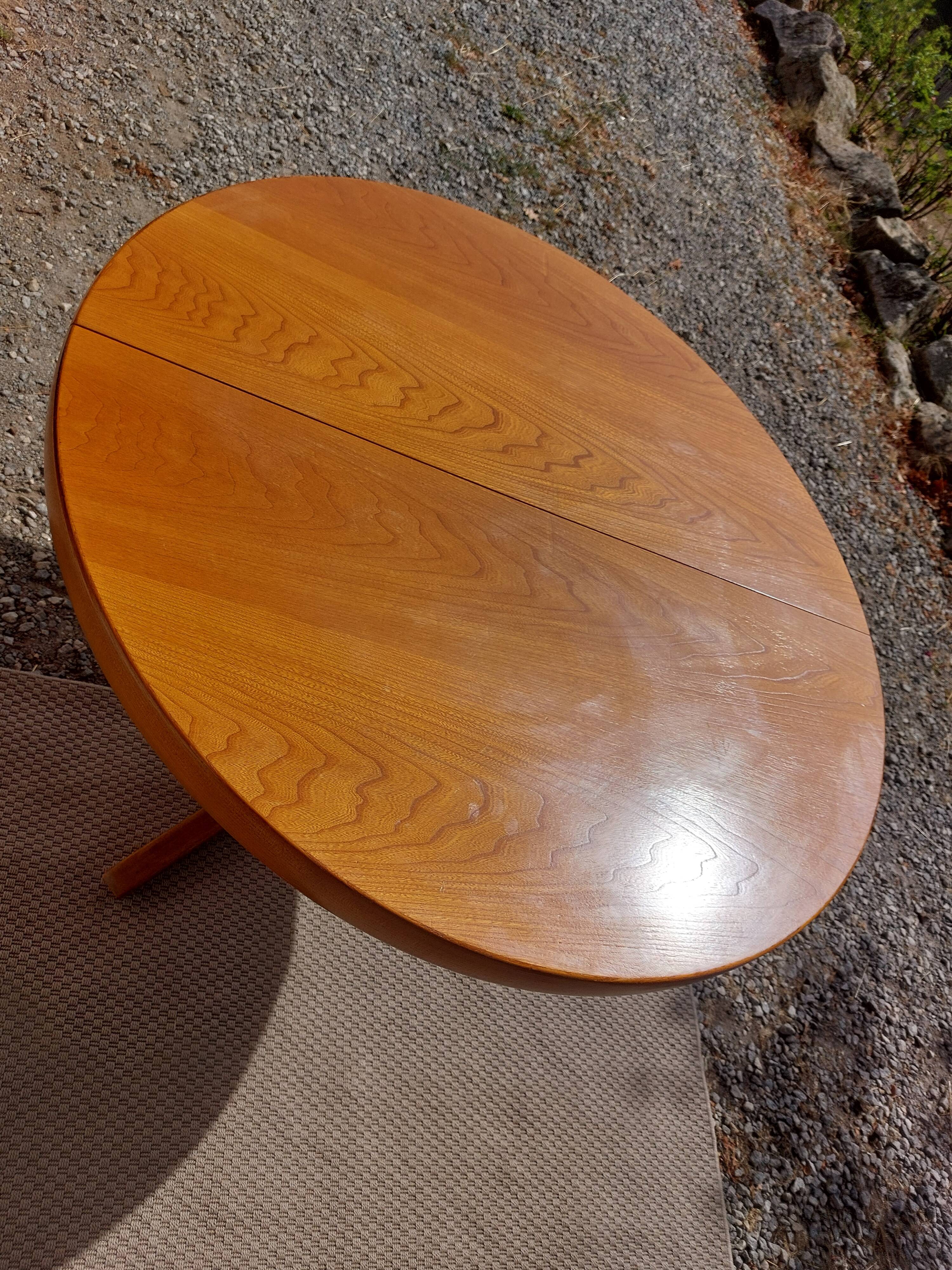 round or oval table with extension, central leg, vintage Baumann design
