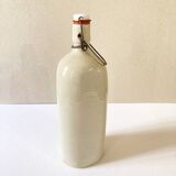 Ancienne bouillotte en grès émaillée gris clair