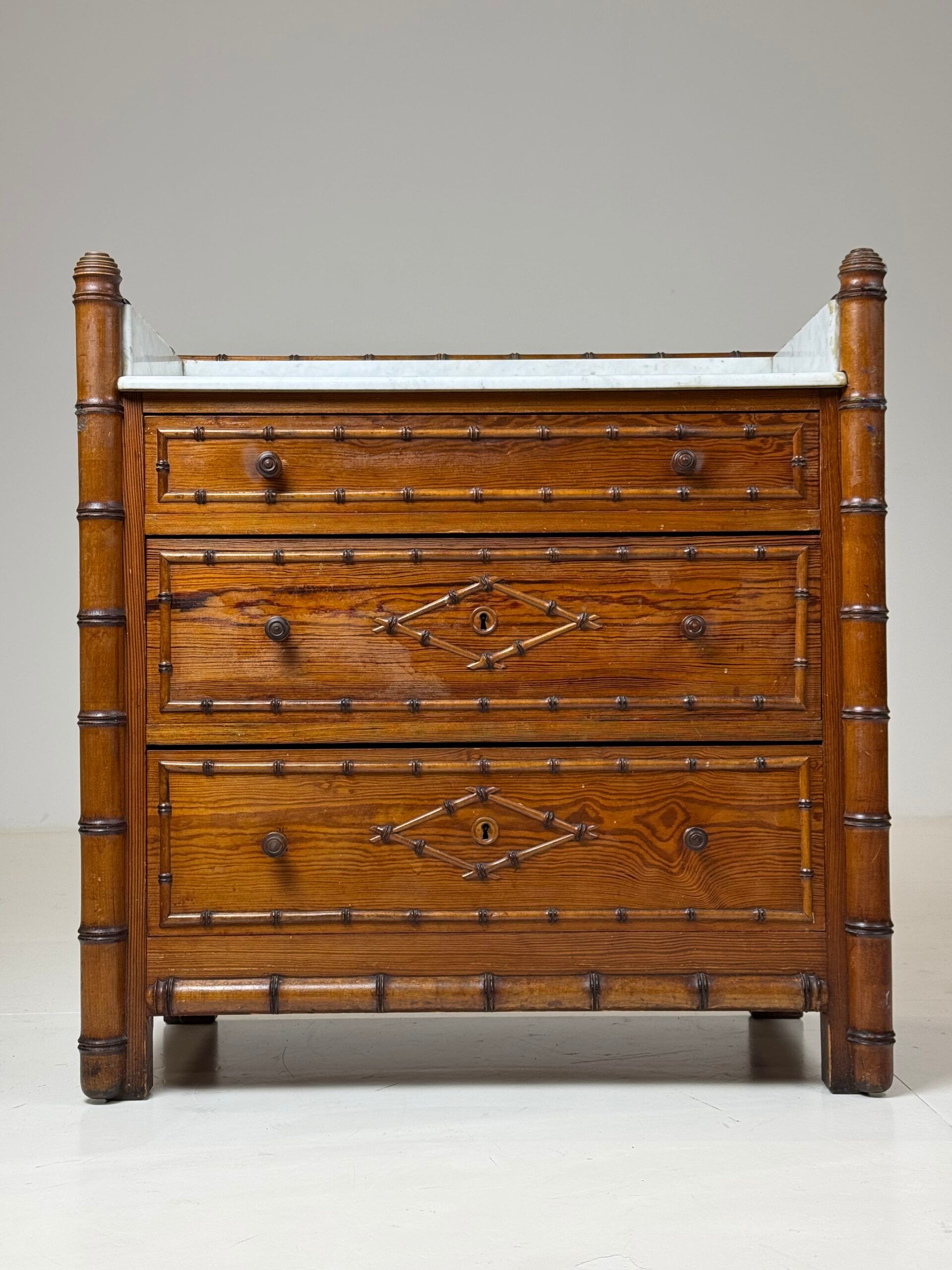Faux bamboo chest of drawers 1900