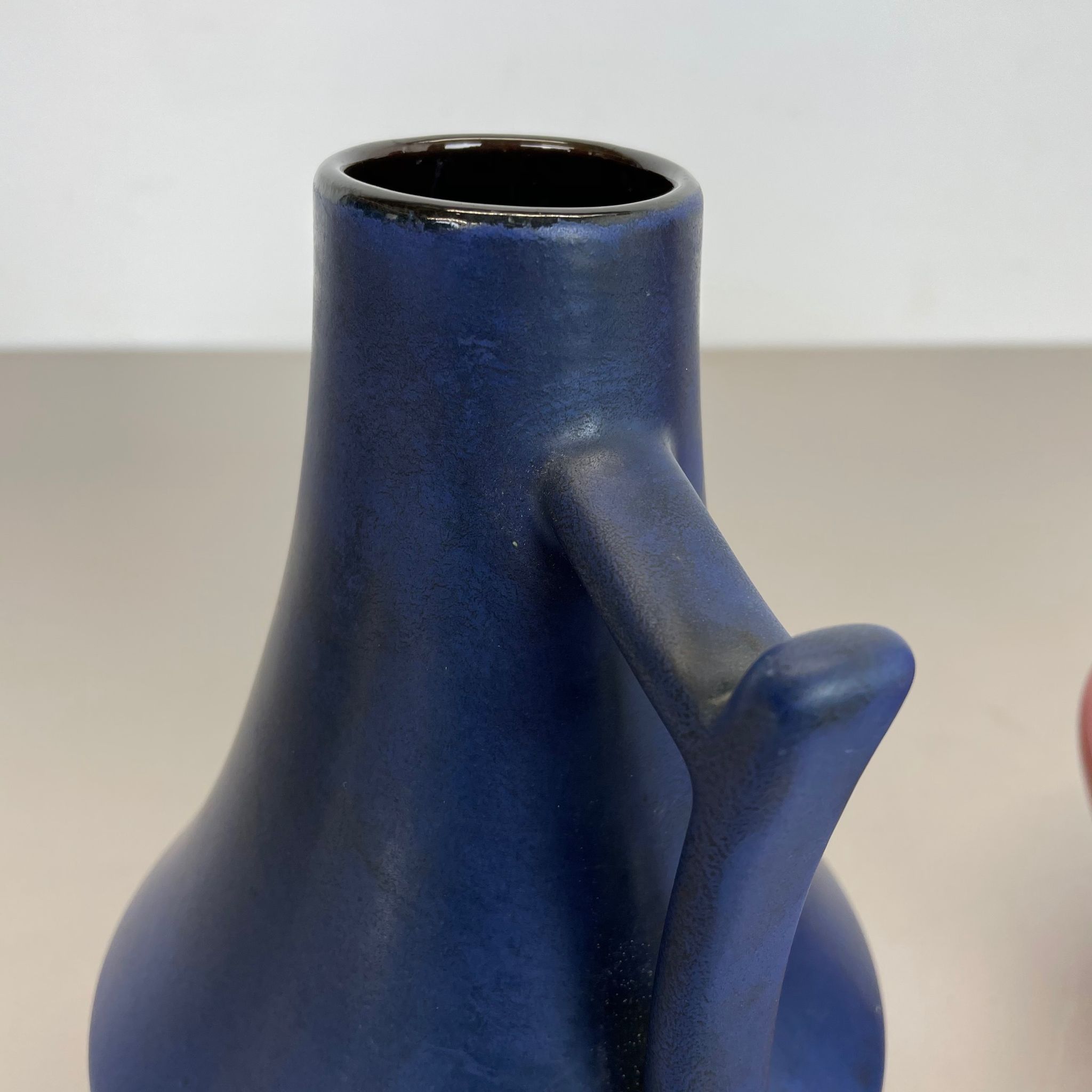 Set of two pottery fat lava vases "black-red" by Jopeko, Germany, 1970s modern