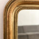 Miroir Louis Philippe perlé doré sculpté 74x98cm