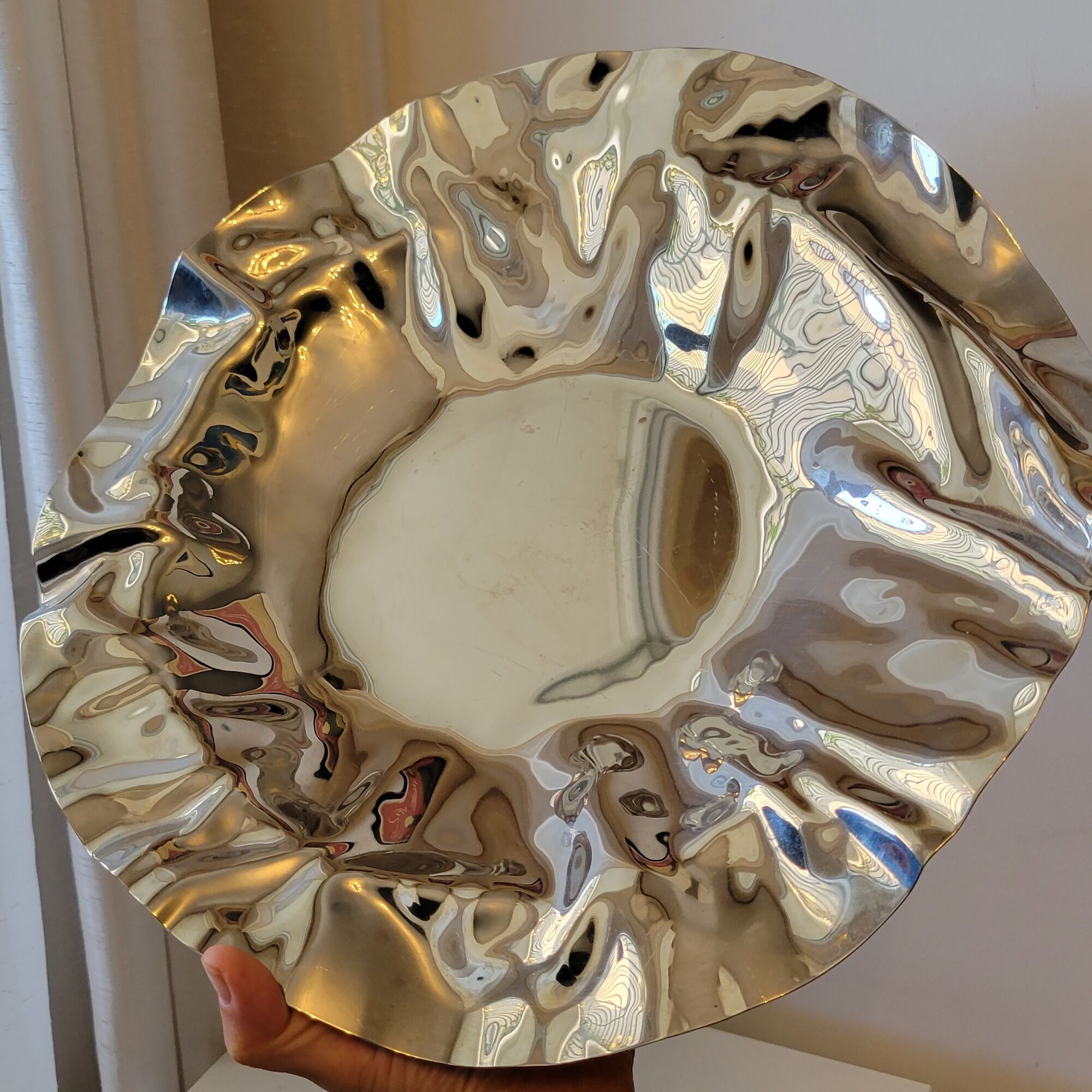 Alessi cut basket flat design Lluis Clotet in crumpled stainless steel