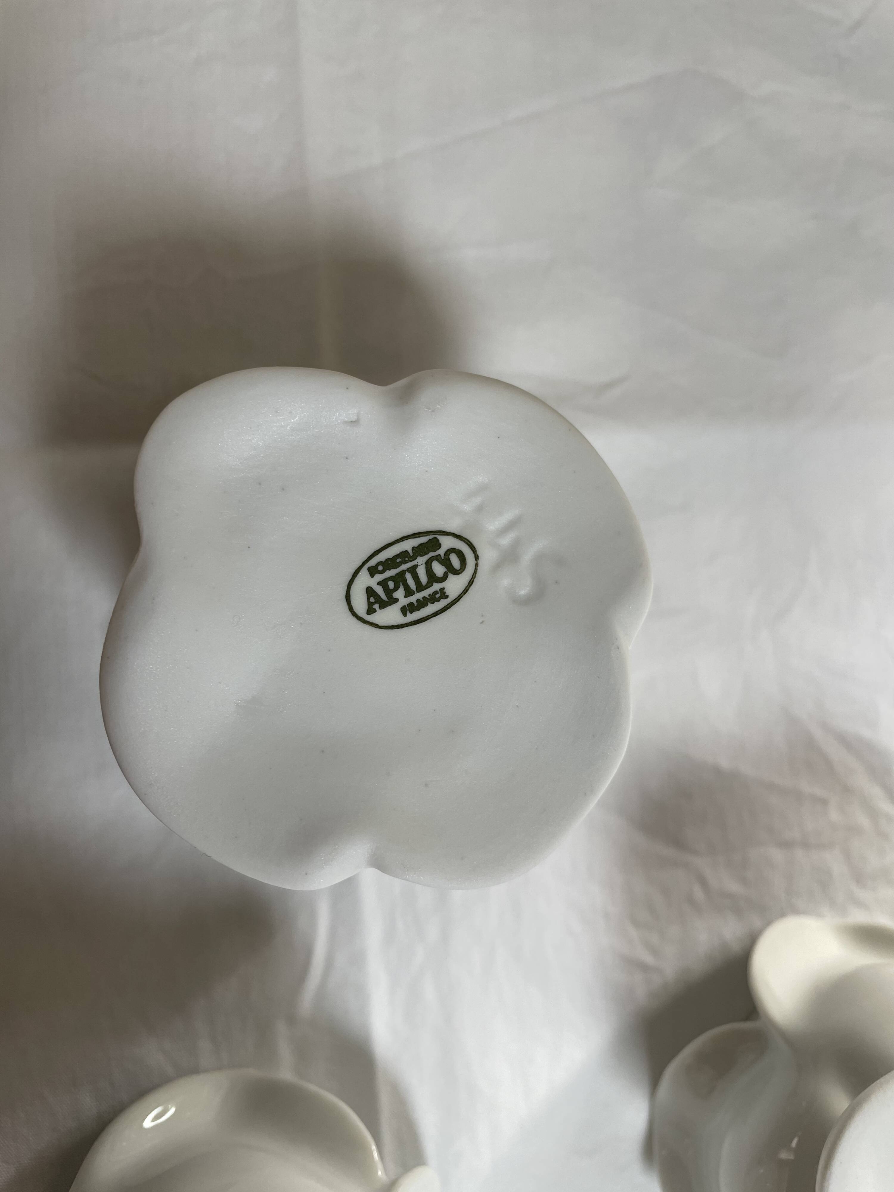 White porcelain rose shaped candle holders