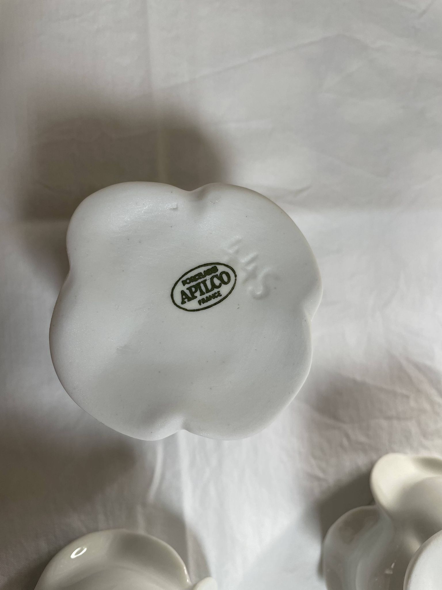 White porcelain rose shaped candle holders