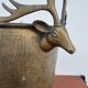 Antique champagne cooler with stag heads