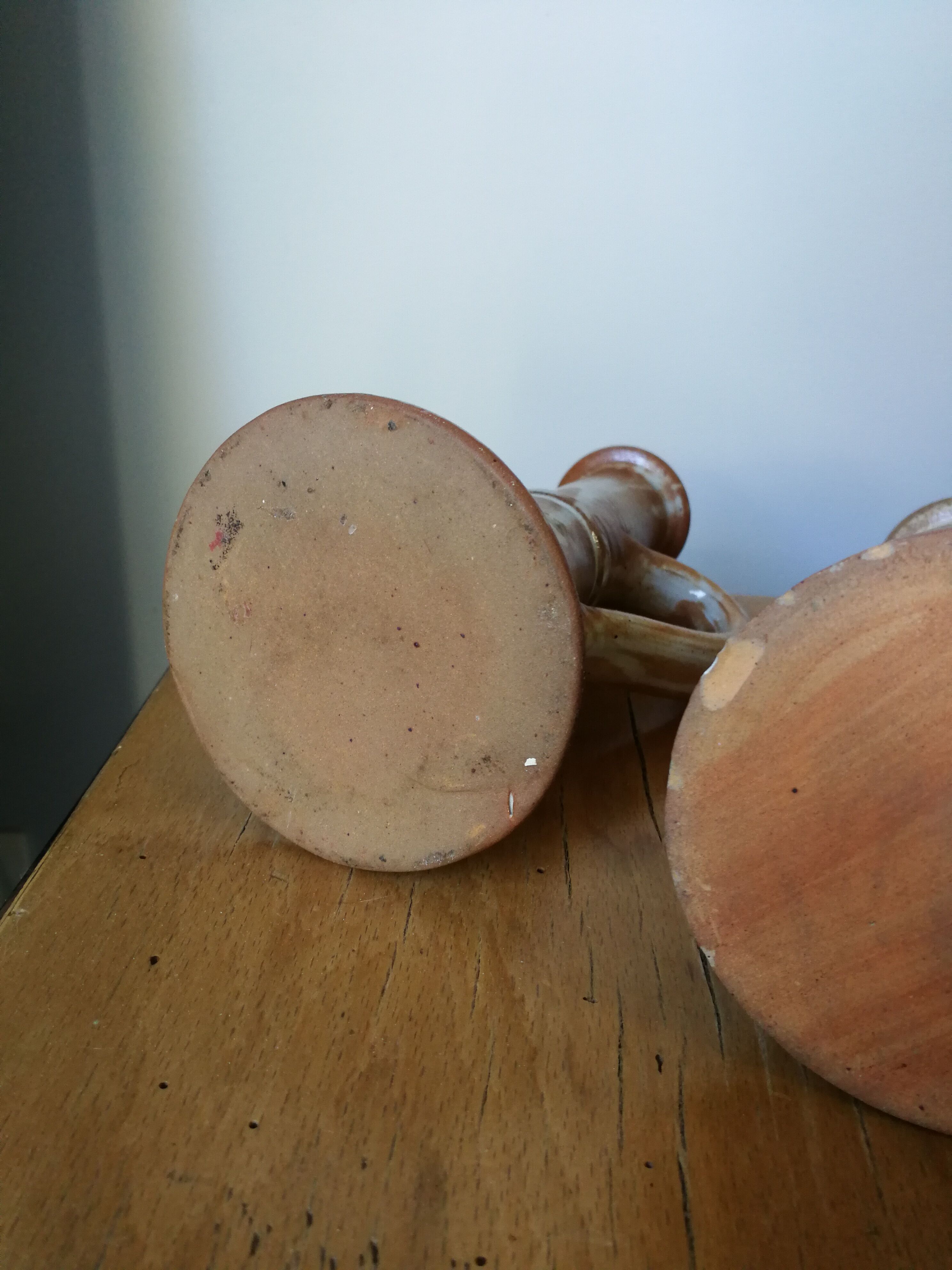 Pair of glazed stoneware candle holders