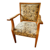 Fauteuil de salon vintage avec tapisserie florale