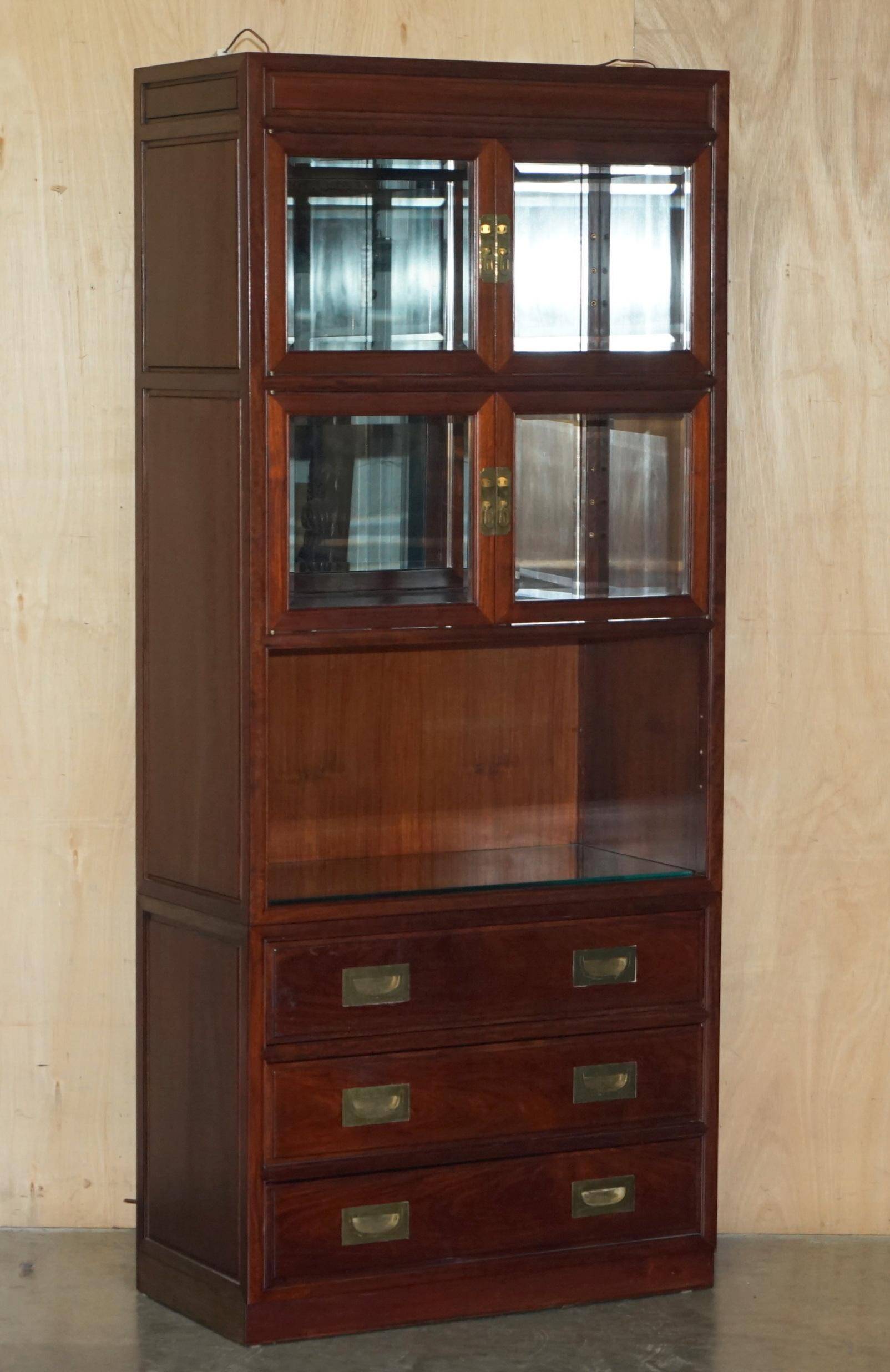 Set of three vintage hardwood military-style bookshelves.