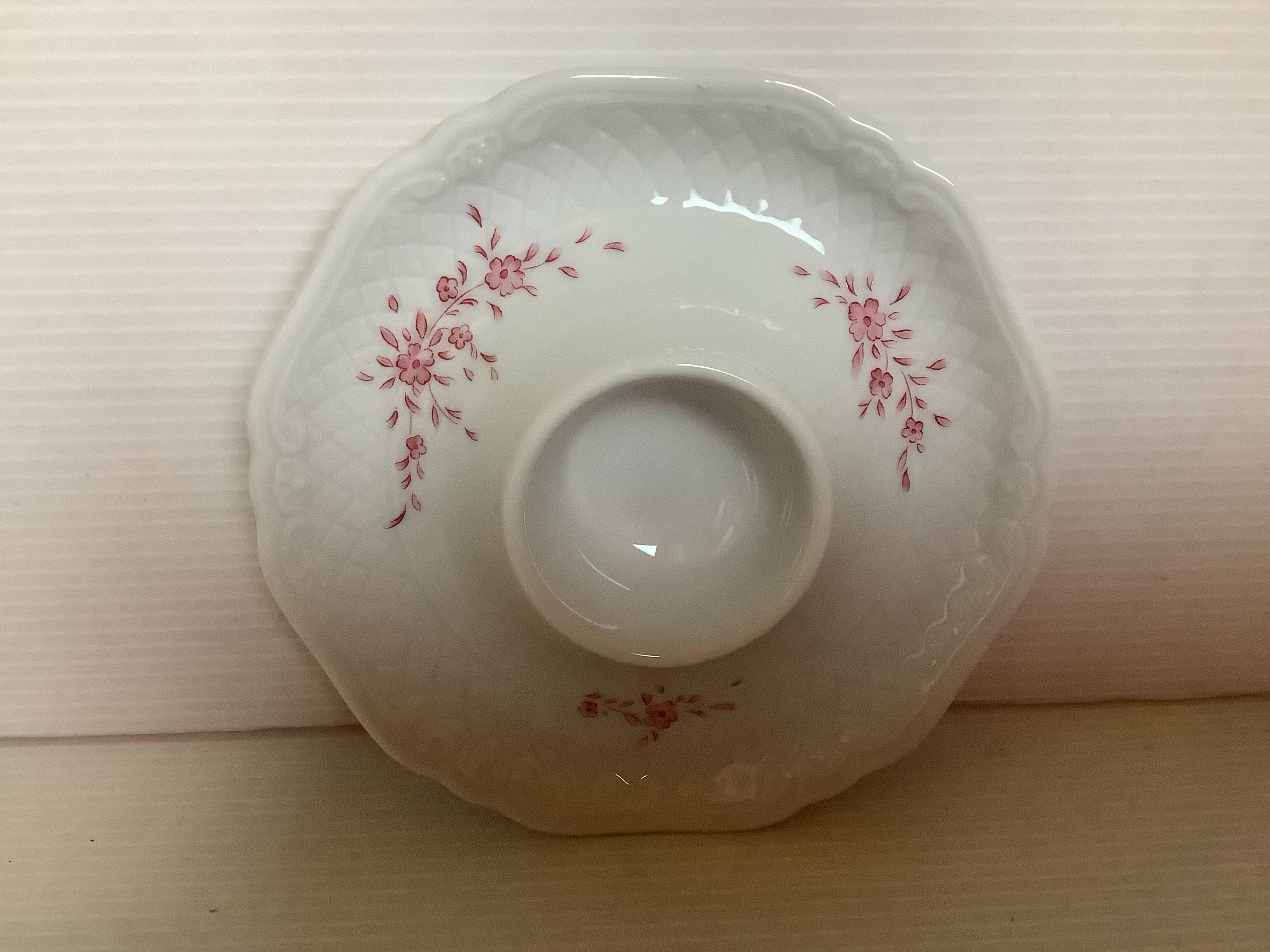 Six egg cups with toile de Jouy flowers