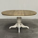 Round extendable oak dining table