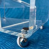 Translucent plexiglass storage drawer/cabinet on wheels.