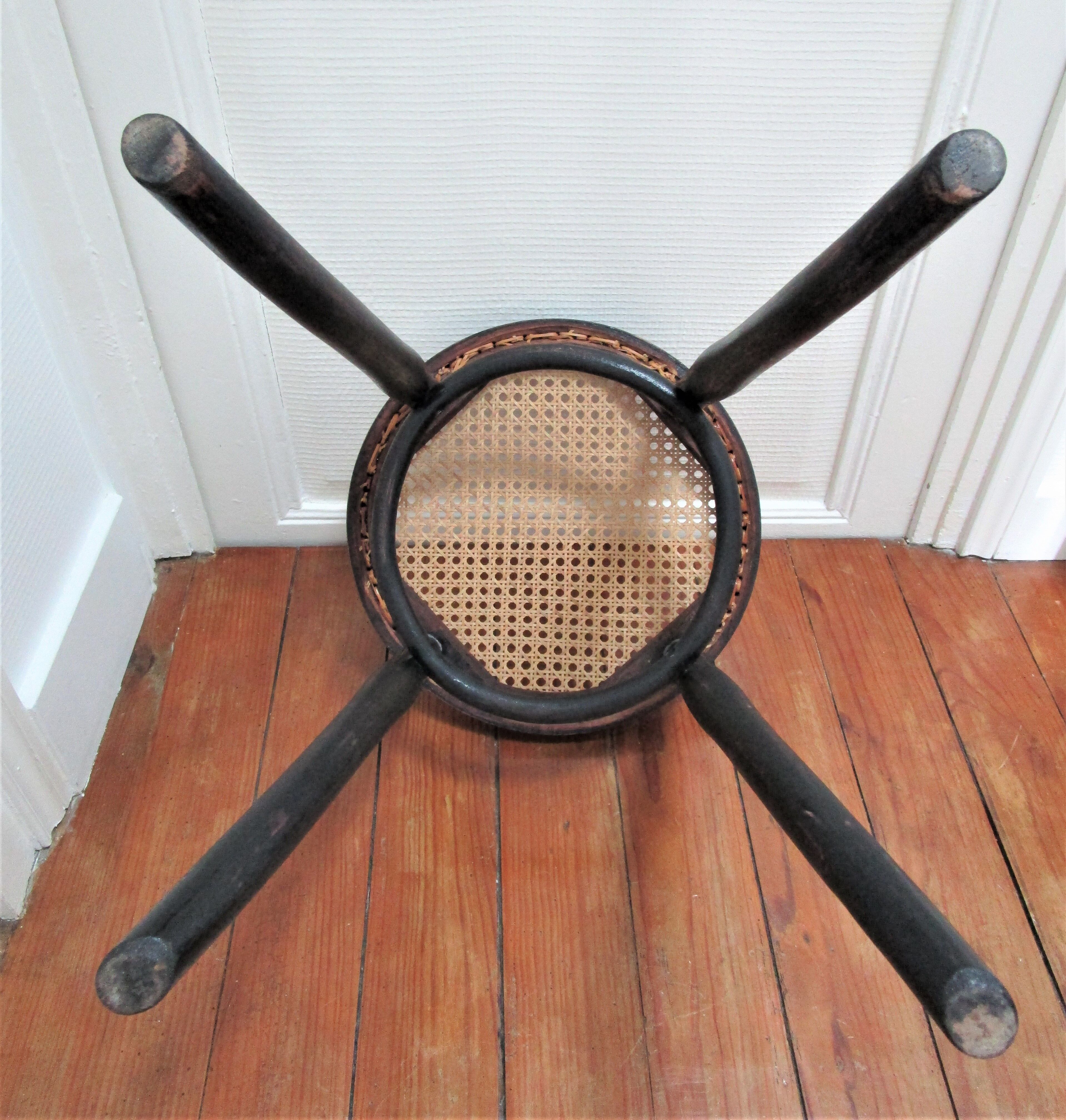 Black skated Thonet stool stamped