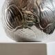 Vintage Italian vase in nickel-plated brass from the 1960s, hand-hammered relief of fruits and leaves.
