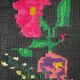 Romanian black wool carpet with a basket of colorful flowers
