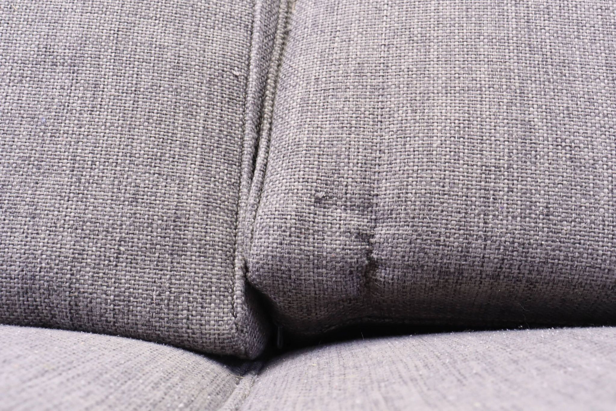 Three-seater Art Deco style sofa in grey fabric and curved wood.