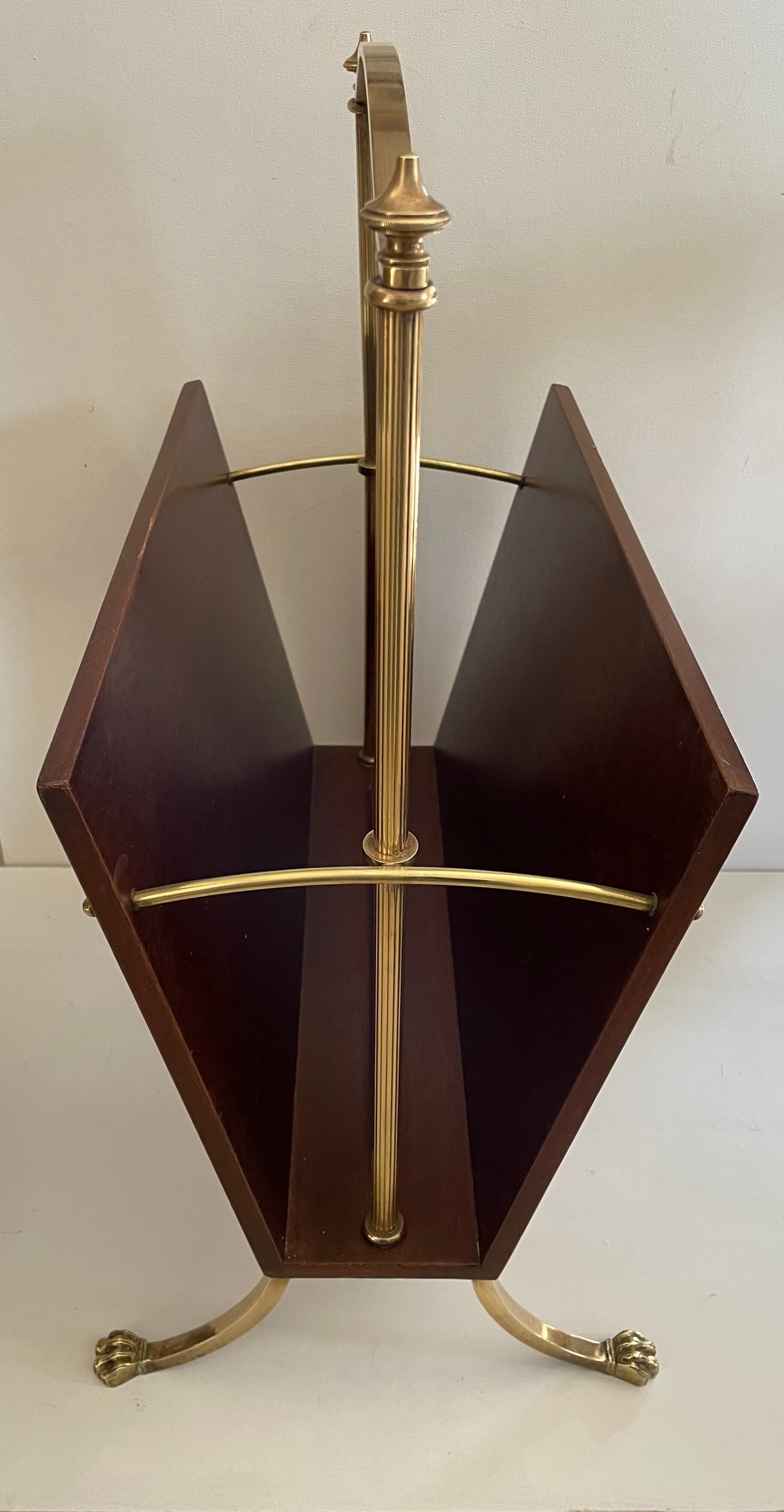 Magazine racks with claw feet by Maison Jansen