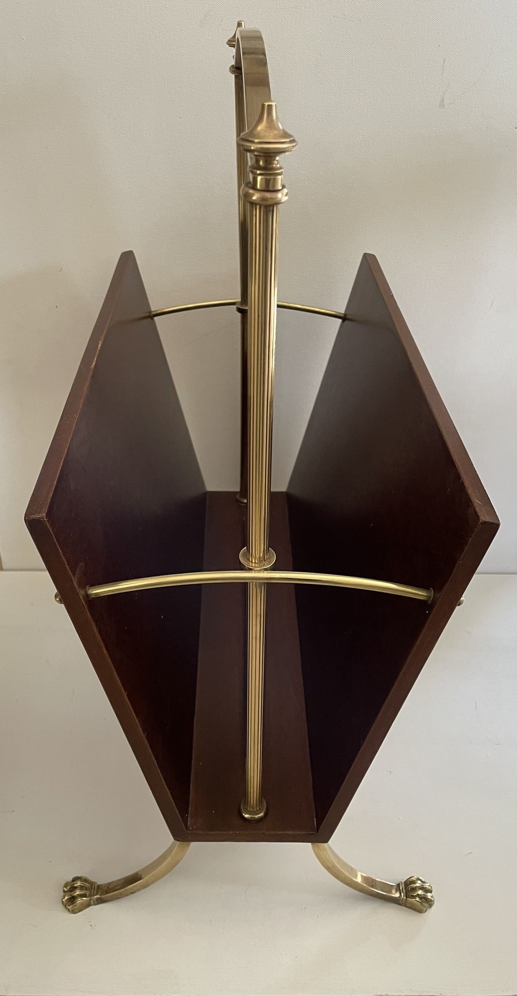 Magazine racks with claw feet by Maison Jansen