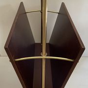 Magazine racks with claw feet by Maison Jansen