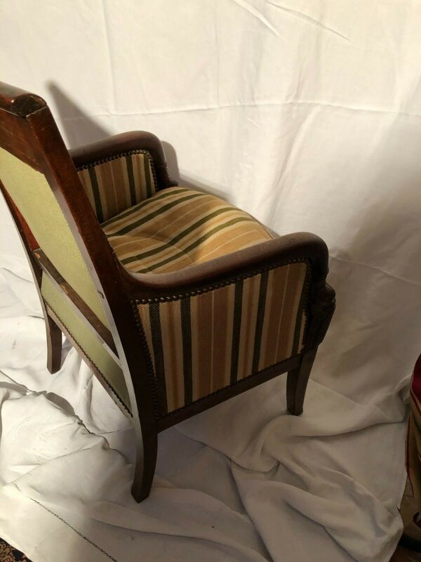 Fauteuil bergère aux dauphins époque Restauration