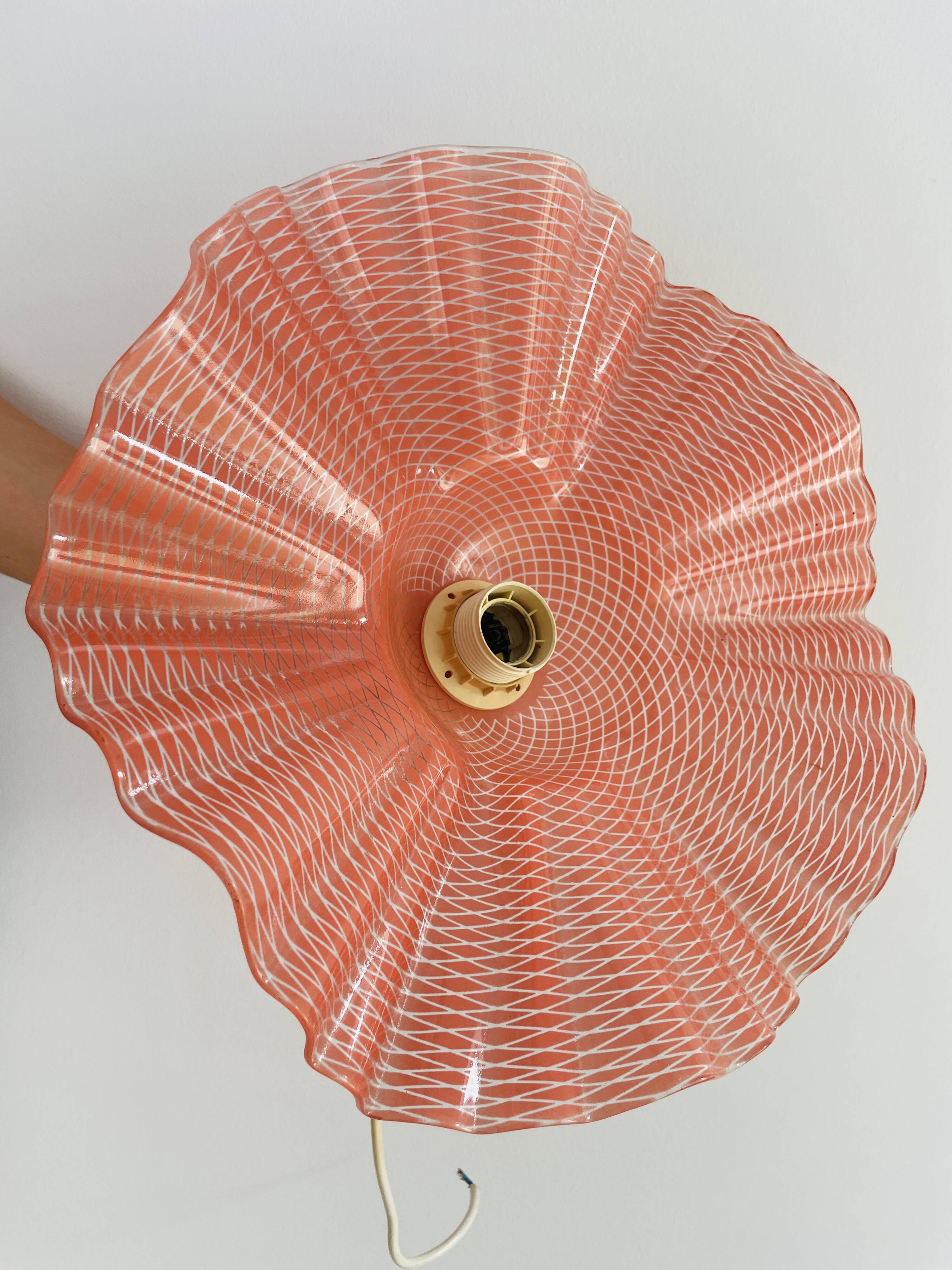 Pink molded glass pendant light