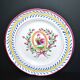 Saint-Clément earthenware rooster plate with floral medallion and ribbon decoration