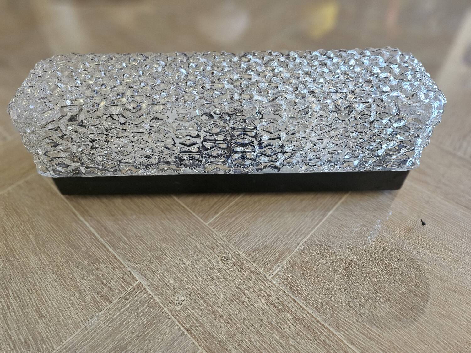 Hammered glass wall light